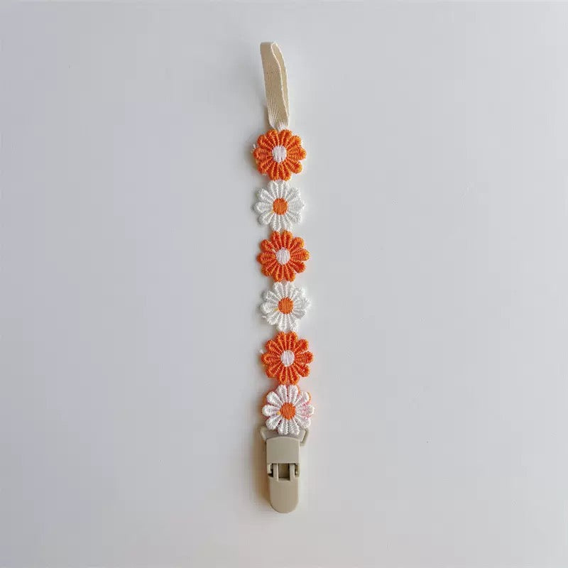 Flor de cadena para chupete (99-223) 12 unidad